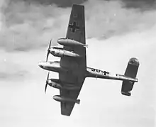 a black and white photograph of a twin-engined monoplane