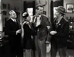 Film still of Edward Arnold, Barbara Stanwyck, Gary Cooper, and Walter Brennan