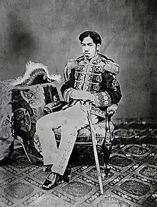 Portrait of a 21 year-old Emperor Meiji seated in military uniform