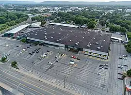 A flyover view of a Menards home improvement store