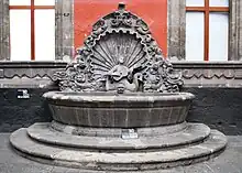 Fountain depicting a mermaid playing a guitar, located in the Museum of the City of Mexico (seventeenth century)