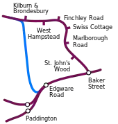 A line is shown at the bottom, from right to left, with stations at Baker Street, Edgware Road and junction before two Paddington stations. From Baker Street a line is shown going north through several stations before turning left. From Edgware Road a line in a contrasting colour is shown, going north bypassing these stations before joining the line from Baker Street just north of Kilburn & Brondesbury.