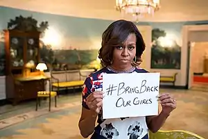 A picture of former First Lady of the United States promoting #BringBackOurGirls