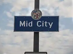 Mid City neighborhood sign  located at the intersection of La Brea Avenue and the Santa Monica Freeway