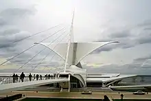 The movable Burke brise soleil on the Quadracci Pavilion of the Milwaukee Art Museum closes at sunset.