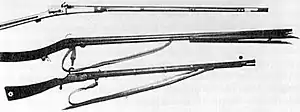 Chinese wall gun (centre) with bipod.