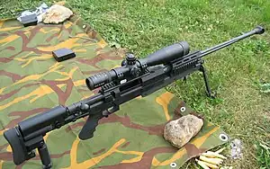 Schmidt & Bender 3-12x50 PM II P telescopic sight fitted with scope rings on a PGM .338 LM sniper rifle.