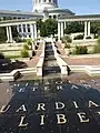 A fountain dedicated to veterans in the Capitol Complex. The text says "Missouri Veterans Guardians of Liberty"