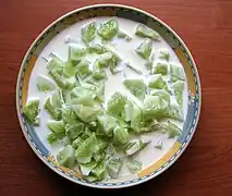 Dish with cucumber cut pieces (mizeria)