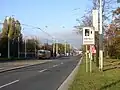 A sign indicating speed limit enforcement ahead in the Czech Republic