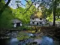 The old water mill "Skovmøllen."