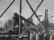 Apparent excavation, with a standing man for scale