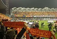 Football fans at Podgorica City Stadium.