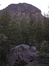 Another view of the east face, with a broken column of crystalline dacite in the foreground.