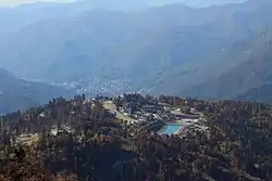 General view of the Krasnaya Polyana from the Psekhako Ridge. In the foreground is a mountain Olympic village.