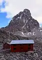 Austrian Hut is found near the Lewis Glacier on the slopes of Point Lenana. The hut sleeps 30 people, with Top Hut nearby for porters.