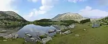 A glacial lake and a mountain summit