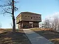 Log building called a blockhouse with tightly fitting beams.