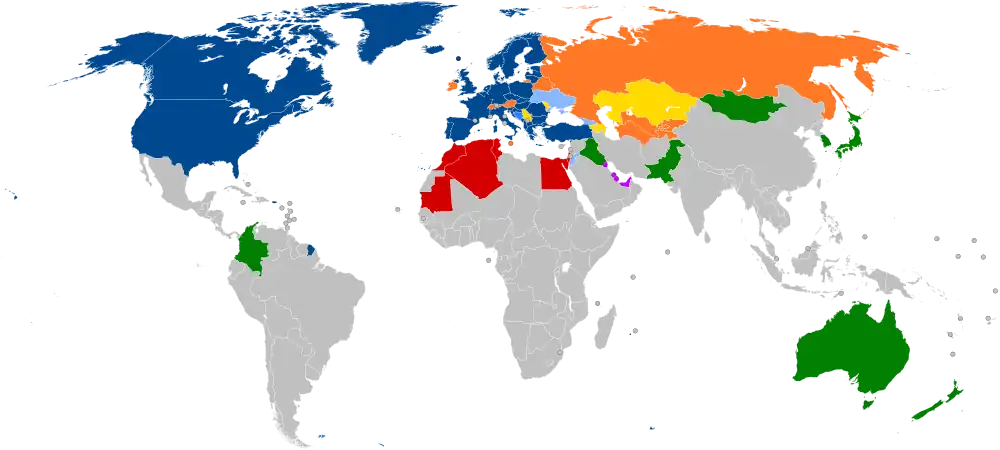 A world map with countries in blue, cyan, orange, yellow, purple, and green, based on their NATO affiliation.