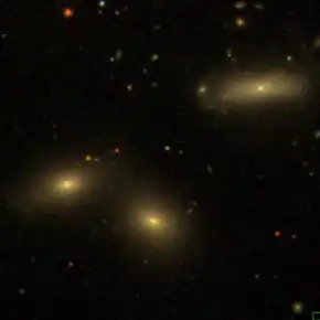 NGC 1190 (upper right) and nearby galaxies (SDSS)