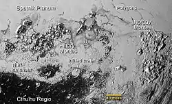 Hillary Montes and Tenzing Montes (labeled Norgay Montes) lie between Sputnik Planitia (top) and Belton Regio (bottom).