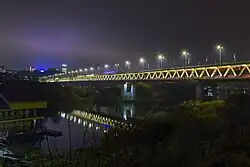 Long rail bridge at sunset