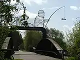 Naburn railway bridge near York, showing "The Fisher of Dreams" iron cage sculpture