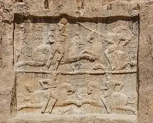 The two-panel equestrian relief.