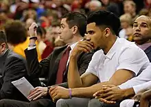 Naz Mitrou-Long sitting on the bench, during Iowas State's 79–76 to Oklahoma.