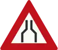 J17: Road narrows on both sides