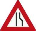 J18: Road narrows on the right side