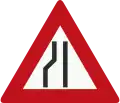 J19: Road narrows on the left side