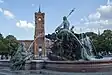 Rotes Rathaus, the city hall of Berlin with Neptunbrunnnen in front