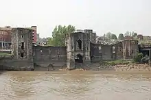 Newport Castle from the east bank. Note the watergate in the centre tower