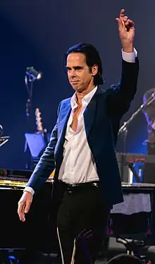 Nick Cave to the side of the camera