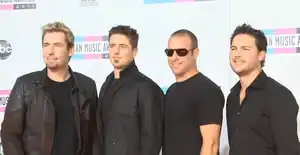 Nickelback in 2011 Left to Right: Chad Kroeger, Daniel Adair, Mike Kroeger, Ryan Peake