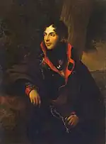 Painting shows a black-haired man in a dark military uniform with red cuffs and lapels.