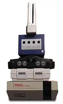 Stack of video-game consoles, of which the Wii is the smallest