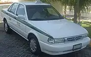 Nissan Tsuru taxi in Cancún