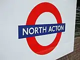 Roundel on westbound platform in May 2008