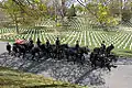 A casket team from the 3rd Infantry Regiment transports the remains of Retired Chief Warrant Officer Michael J. Novosel during a funeral procession at Arlington National Cemetery on April 13, 2006.