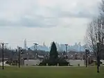 A view of the New York City skyline from the Queens College quad.