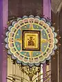 The icon in its mosaic frame, enshrined above the high altar.