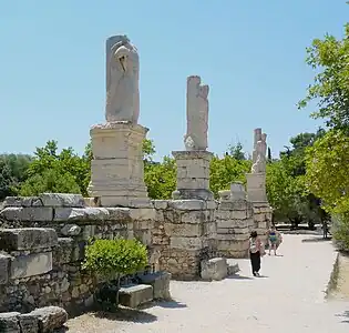 The remains of Triton-shaped atlantes from the Odeon of Agrippa, Athens, Greece