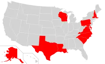 "A map of the United States with Alaska,, Wisconsin and Texas in red along with a swathe of the north eastern states."