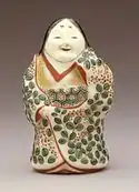 Banko ware Okame female figurine, Edo period, 19th century