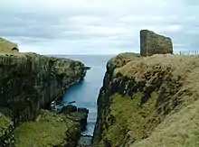 Photograph of a ruinous stone castle