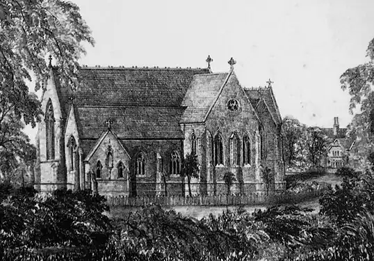 The stone church in the 1880s after the vicarage was built but before the steeple was added