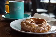 A glazed old-fashioned doughnut