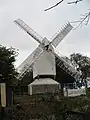 Post mill with roundhouse.